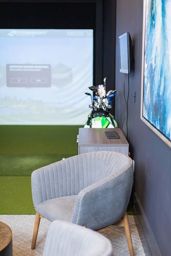 A chair in front of a projector 